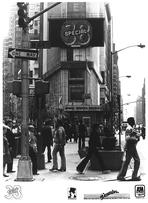 Early promotional picture with the bands name up on lights in Times Square.