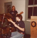 Larry Junstrom (L.J.) working on some chops while Dan sits at the kit.